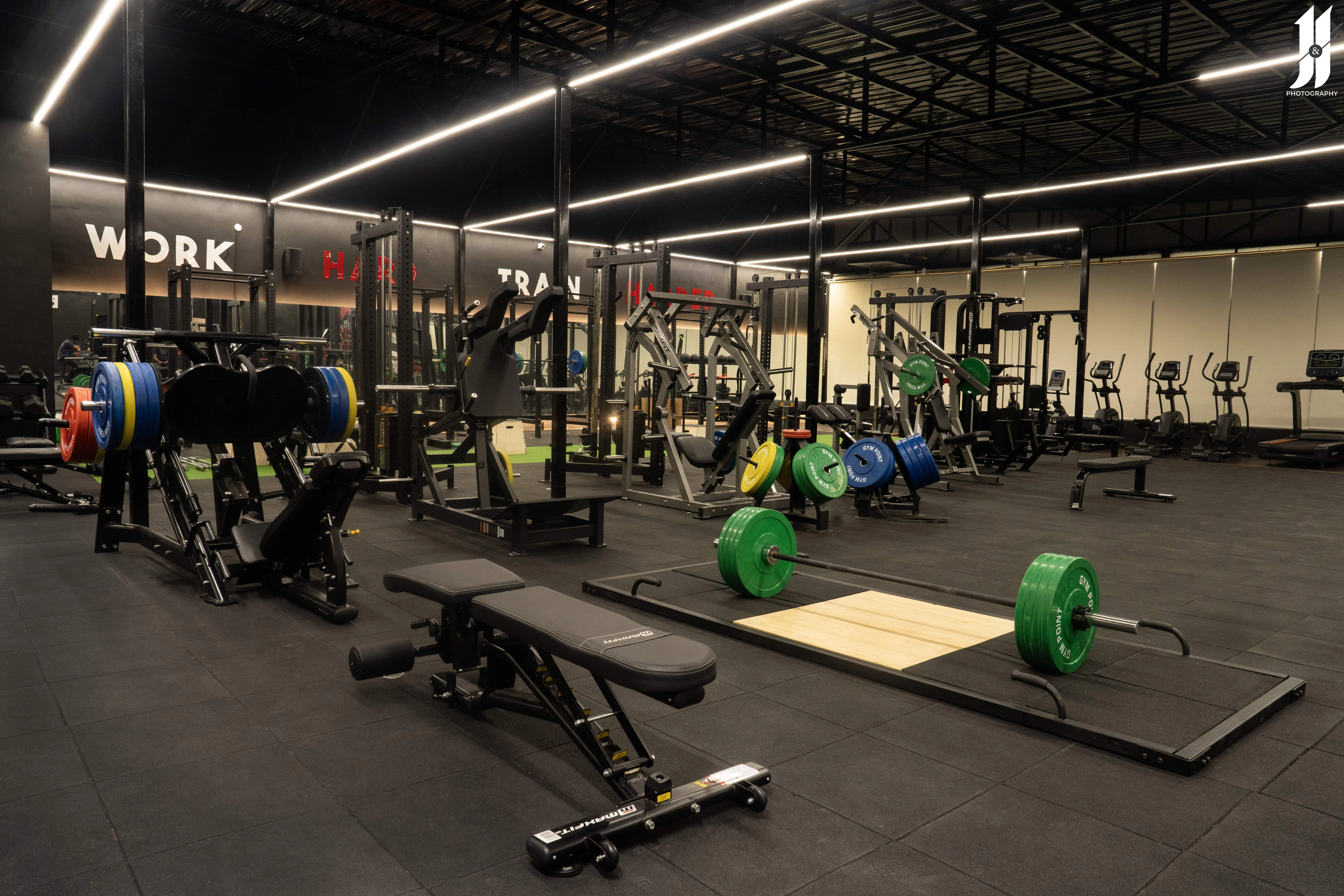Spacious gym with cardio machines, fitness center